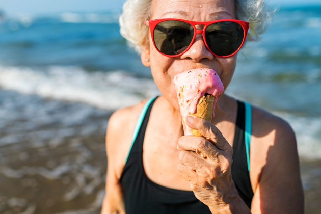 elderly woman eating ice cream